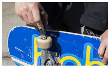 how to get bearing out of skateboard wheel