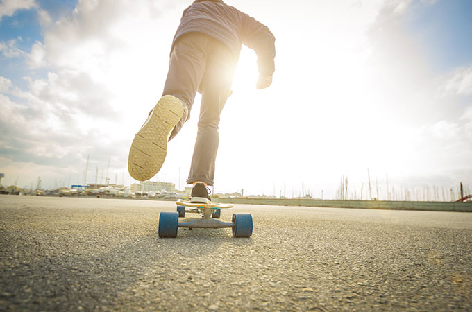 how to ride a longboard beginner