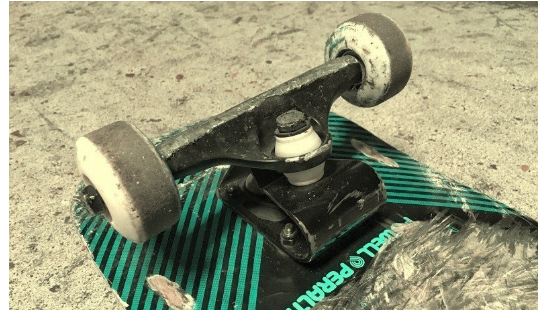 how to loosen the trucks on a longboard